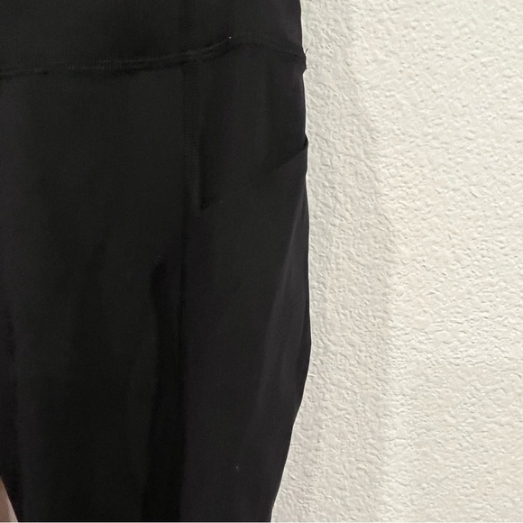 Lululemon black leggings size 4 with side leg pockets back pocket and panels - Picture 2 of 13